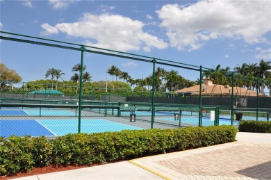Prestigious Cascades Community of Boynton Beach, bordering the on Westchester Golf and Country Club in Florida - for sale on GolfHomes.com, golf home, golf lot