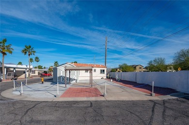 Rare oversized corner RV lot in gated Riverview RV Resort on Riverview Golf Course in Arizona - for sale on GolfHomes.com, golf home, golf lot