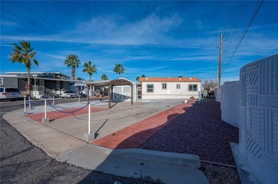 Rare oversized corner RV lot in gated Riverview RV Resort on Riverview Golf Course in Arizona - for sale on GolfHomes.com, golf home, golf lot