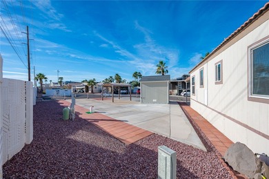 Rare oversized corner RV lot in gated Riverview RV Resort on Riverview Golf Course in Arizona - for sale on GolfHomes.com, golf home, golf lot