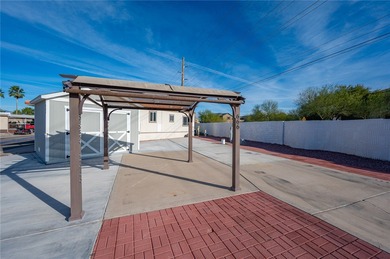 Rare oversized corner RV lot in gated Riverview RV Resort on Riverview Golf Course in Arizona - for sale on GolfHomes.com, golf home, golf lot