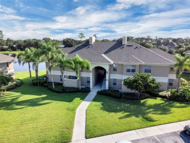This beautiful second-floor Eagle Pond condo in the 24/7 on Cypresswood Golf and Country Club in Florida - for sale on GolfHomes.com, golf home, golf lot
