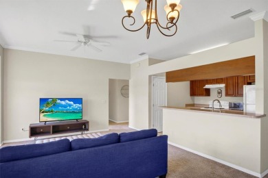 This beautiful second-floor Eagle Pond condo in the 24/7 on Cypresswood Golf and Country Club in Florida - for sale on GolfHomes.com, golf home, golf lot