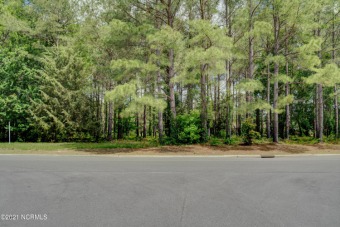 Build your custom dream home on this pond front lot with .37 on River Landing - River Course in North Carolina - for sale on GolfHomes.com, golf home, golf lot