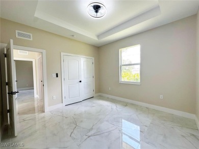 Stunning new construction home in the fast-growing and vibrant on River Hall Country Club in Florida - for sale on GolfHomes.com, golf home, golf lot