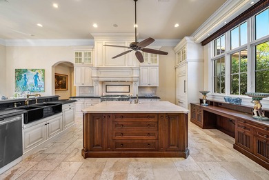 Experience Ultra-Luxury in This Sprawling Single Story Estate at on Old Marsh Golf Club in Florida - for sale on GolfHomes.com, golf home, golf lot
