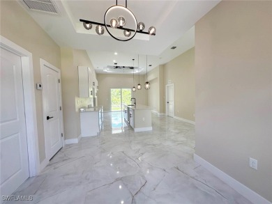 Stunning new construction home in the fast-growing and vibrant on River Hall Country Club in Florida - for sale on GolfHomes.com, golf home, golf lot