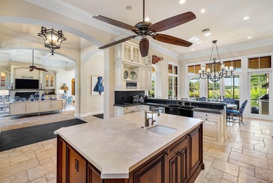 Experience Ultra-Luxury in This Sprawling Single Story Estate at on Old Marsh Golf Club in Florida - for sale on GolfHomes.com, golf home, golf lot