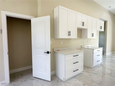 Stunning new construction home in the fast-growing and vibrant on River Hall Country Club in Florida - for sale on GolfHomes.com, golf home, golf lot