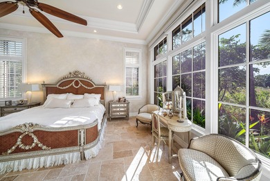 Experience Ultra-Luxury in This Sprawling Single Story Estate at on Old Marsh Golf Club in Florida - for sale on GolfHomes.com, golf home, golf lot