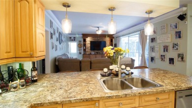Welcome to your dream home in the prestigious Seminole Golf and on Seminole Lake Country Club in Florida - for sale on GolfHomes.com, golf home, golf lot