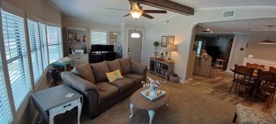 Come settle down and relax in a beautiful, manufactured home on Fairways Country Club in Florida - for sale on GolfHomes.com, golf home, golf lot