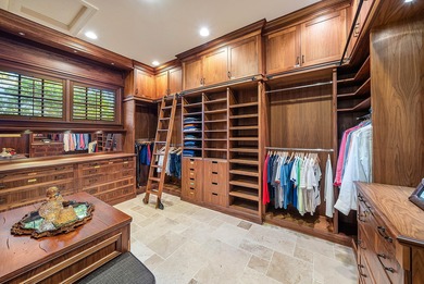 Experience Ultra-Luxury in This Sprawling Single Story Estate at on Old Marsh Golf Club in Florida - for sale on GolfHomes.com, golf home, golf lot