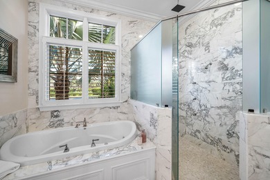 Experience Ultra-Luxury in This Sprawling Single Story Estate at on Old Marsh Golf Club in Florida - for sale on GolfHomes.com, golf home, golf lot