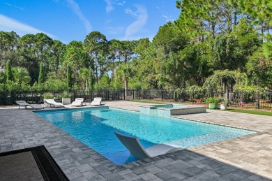 Home has a new tile roof and is a 6 bedroom home with 6 on Regatta Bay Golf and Country Club in Florida - for sale on GolfHomes.com, golf home, golf lot