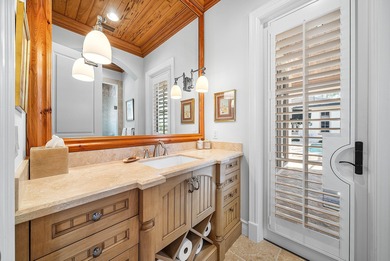 Experience Ultra-Luxury in This Sprawling Single Story Estate at on Old Marsh Golf Club in Florida - for sale on GolfHomes.com, golf home, golf lot