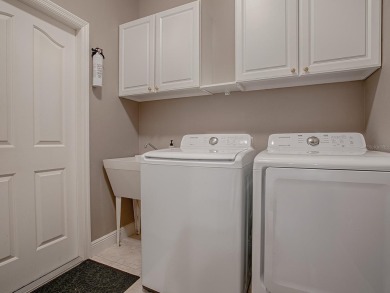 Come into a realm where quality and value unite harmoniously in on The Links of Spruce Creek in Florida - for sale on GolfHomes.com, golf home, golf lot