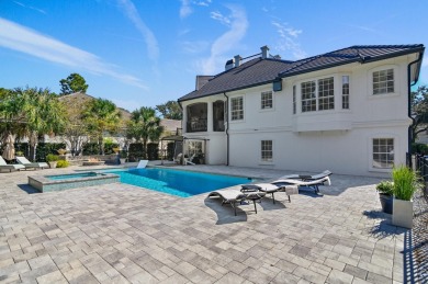 Home has a new tile roof and is a 6 bedroom home with 6 on Regatta Bay Golf and Country Club in Florida - for sale on GolfHomes.com, golf home, golf lot