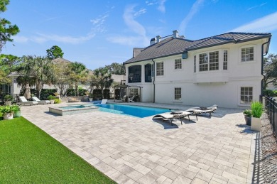 Home has a new tile roof and is a 6 bedroom home with 6 on Regatta Bay Golf and Country Club in Florida - for sale on GolfHomes.com, golf home, golf lot