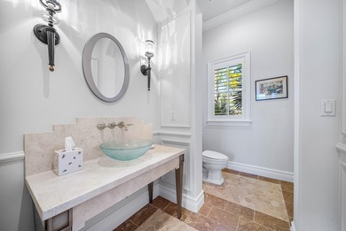 Experience Ultra-Luxury in This Sprawling Single Story Estate at on Old Marsh Golf Club in Florida - for sale on GolfHomes.com, golf home, golf lot