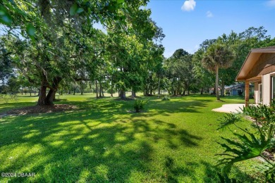 Welcome to your dream home nestled on the picturesque Riviera on Riviera Country Club in Florida - for sale on GolfHomes.com, golf home, golf lot