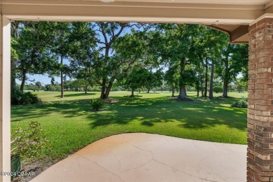 Welcome to your dream home nestled on the picturesque Riviera on Riviera Country Club in Florida - for sale on GolfHomes.com, golf home, golf lot