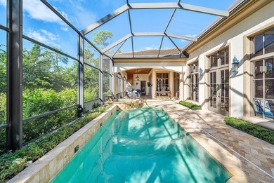Experience Ultra-Luxury in This Sprawling Single Story Estate at on Old Marsh Golf Club in Florida - for sale on GolfHomes.com, golf home, golf lot