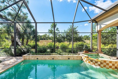 Experience Ultra-Luxury in This Sprawling Single Story Estate at on Old Marsh Golf Club in Florida - for sale on GolfHomes.com, golf home, golf lot