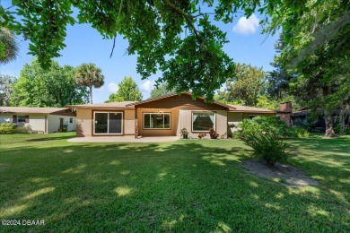 Welcome to your dream home nestled on the picturesque Riviera on Riviera Country Club in Florida - for sale on GolfHomes.com, golf home, golf lot