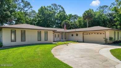 Welcome to your dream home nestled on the picturesque Riviera on Riviera Country Club in Florida - for sale on GolfHomes.com, golf home, golf lot