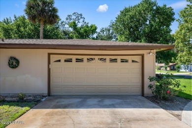 Welcome to your dream home nestled on the picturesque Riviera on Riviera Country Club in Florida - for sale on GolfHomes.com, golf home, golf lot