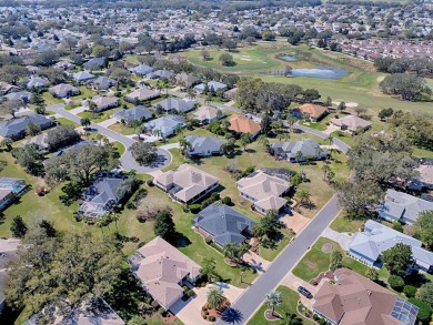 Come into a realm where quality and value unite harmoniously in on The Links of Spruce Creek in Florida - for sale on GolfHomes.com, golf home, golf lot