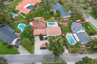 Mediterranean Revival Estate with NEW Custom Pool in Temple on Temple Terrace Golf and Country Club in Florida - for sale on GolfHomes.com, golf home, golf lot