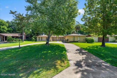 Welcome to your dream home nestled on the picturesque Riviera on Riviera Country Club in Florida - for sale on GolfHomes.com, golf home, golf lot