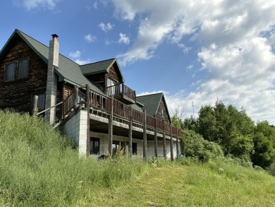 Experience luxury and serenity with this beautifully appointed 3 on Eagle Ridge Golf Course in Michigan - for sale on GolfHomes.com, golf home, golf lot