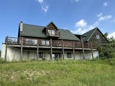 Experience luxury and serenity with this beautifully appointed 3 on Eagle Ridge Golf Course in Michigan - for sale on GolfHomes.com, golf home, golf lot