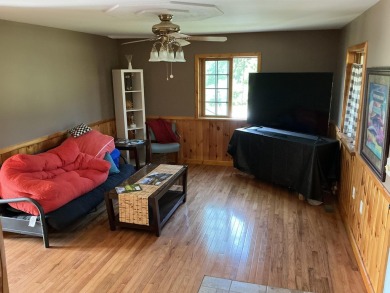 Experience luxury and serenity with this beautifully appointed 3 on Eagle Ridge Golf Course in Michigan - for sale on GolfHomes.com, golf home, golf lot