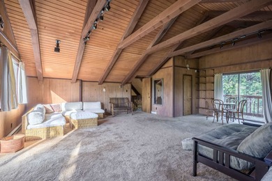 Magic in the Angel Fire Forest ~ This extraordinary Angel Fire on Angel Fire Resort Country Club in New Mexico - for sale on GolfHomes.com, golf home, golf lot