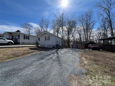Welcome to Lake Life! This 1990 one bed/bath Park Model has been on Old North State Club at Uwharrie Point Golf community in North Carolina - for sale on GolfHomes.com, golf home, golf lot