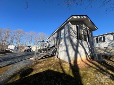Welcome to Lake Life! This 1990 one bed/bath Park Model has been on Old North State Club at Uwharrie Point Golf community in North Carolina - for sale on GolfHomes.com, golf home, golf lot