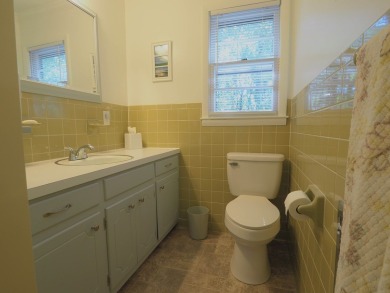 Welcome to a move-in ready charming cabin that is tucked into on Skyland Lakes Golf Course in Virginia - for sale on GolfHomes.com, golf home, golf lot