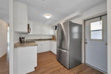 Welcome to Port Charlotte Village - Voted #1 Manufactured Home on Kings Gate Golf Club in Florida - for sale on GolfHomes.com, golf home, golf lot