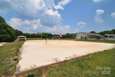 Welcome to Lake Life! This 1990 one bed/bath Park Model has been on Old North State Club at Uwharrie Point Golf community in North Carolina - for sale on GolfHomes.com, golf home, golf lot