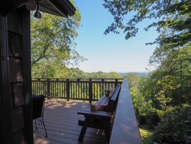 Welcome to a move-in ready charming cabin that is tucked into on Skyland Lakes Golf Course in Virginia - for sale on GolfHomes.com, golf home, golf lot