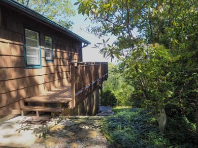 Welcome to a move-in ready charming cabin that is tucked into on Skyland Lakes Golf Course in Virginia - for sale on GolfHomes.com, golf home, golf lot