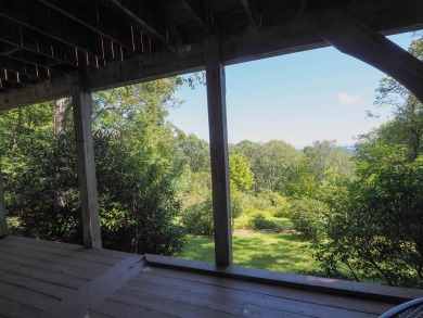 Welcome to a move-in ready charming cabin that is tucked into on Skyland Lakes Golf Course in Virginia - for sale on GolfHomes.com, golf home, golf lot