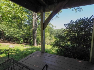 Welcome to a move-in ready charming cabin that is tucked into on Skyland Lakes Golf Course in Virginia - for sale on GolfHomes.com, golf home, golf lot