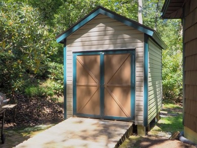 Welcome to a move-in ready charming cabin that is tucked into on Skyland Lakes Golf Course in Virginia - for sale on GolfHomes.com, golf home, golf lot