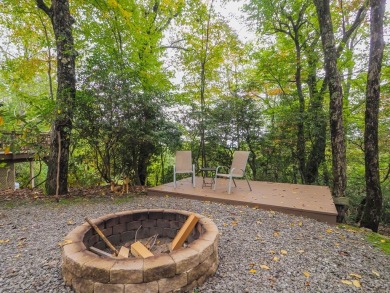 Welcome to a move-in ready charming cabin that is tucked into on Skyland Lakes Golf Course in Virginia - for sale on GolfHomes.com, golf home, golf lot