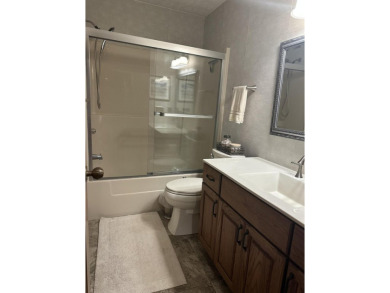 Enjoy golf course living in this comfortable 3 bed, 3 bath home on Michaywe Pines Course in Michigan - for sale on GolfHomes.com, golf home, golf lot